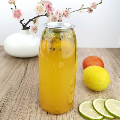 las latas de bebida del plástico transparente 650ml con las tapas rápidas ordeñan las bebidas