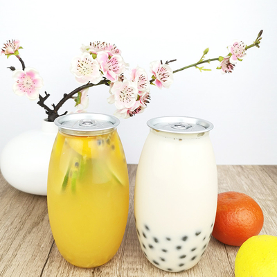 El envase abierto fácil del plástico transparente de las latas de 0,5 litros embotella los jugos planchados en frío de la leche del té